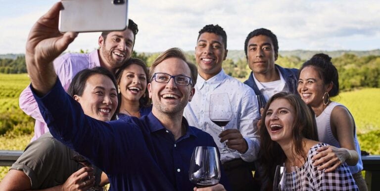 Group of people at a meeting taking a selfie